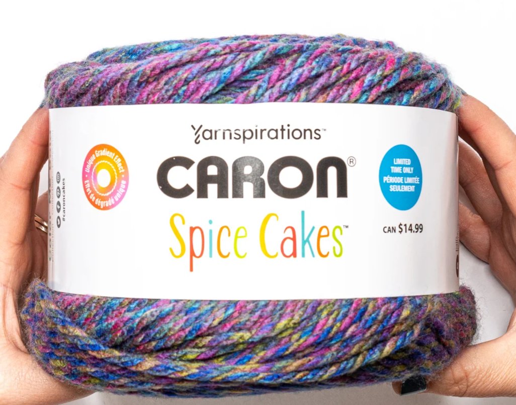 Colorful crochet blanket made with Caron Cakes self-striping yarn in gradient colors